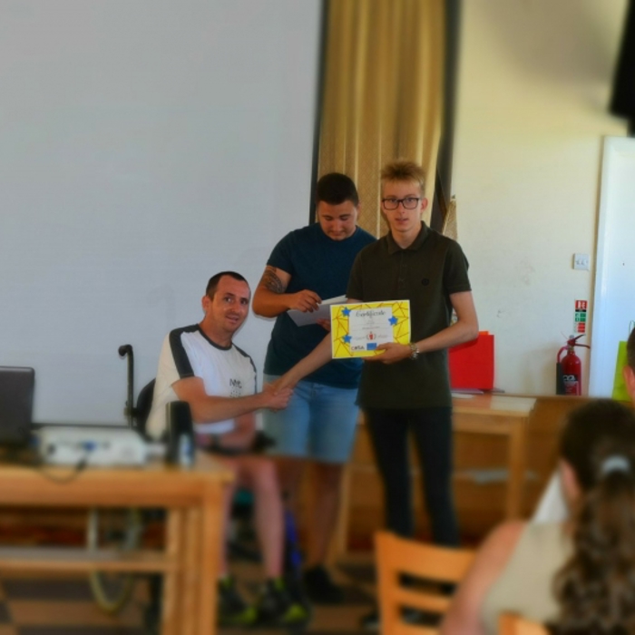 people holding a certificate 