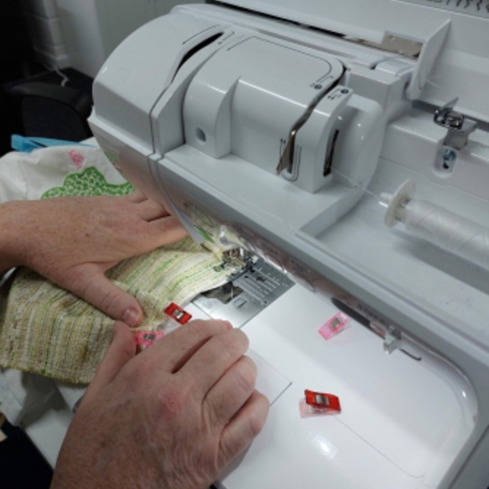 sewing machine in use