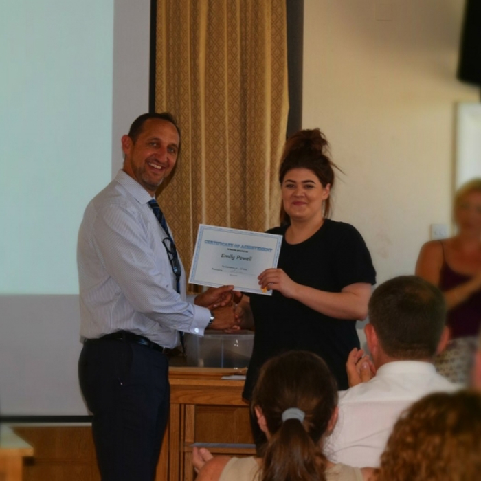 people holding a certificate 